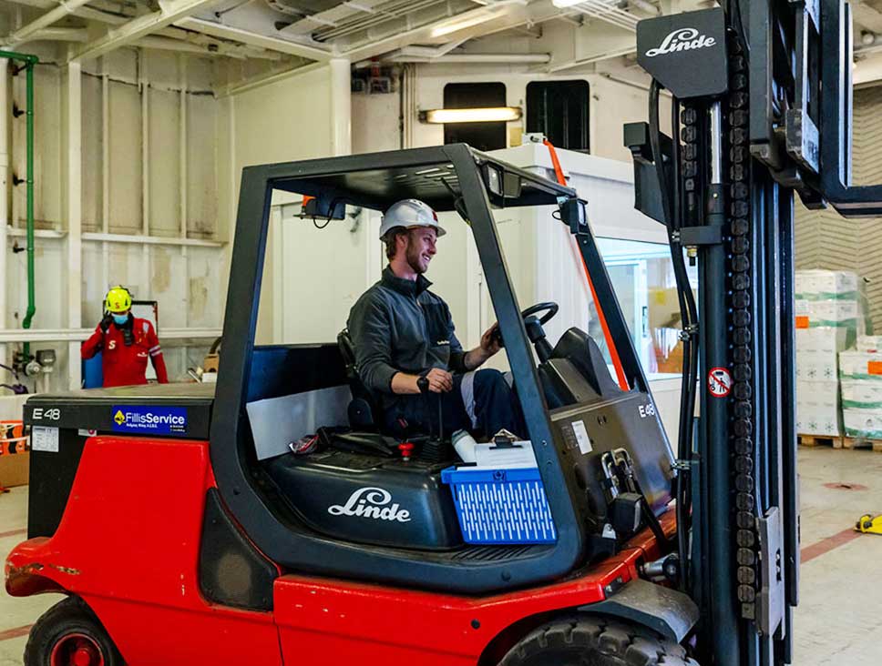 Electric forklift on cardeck